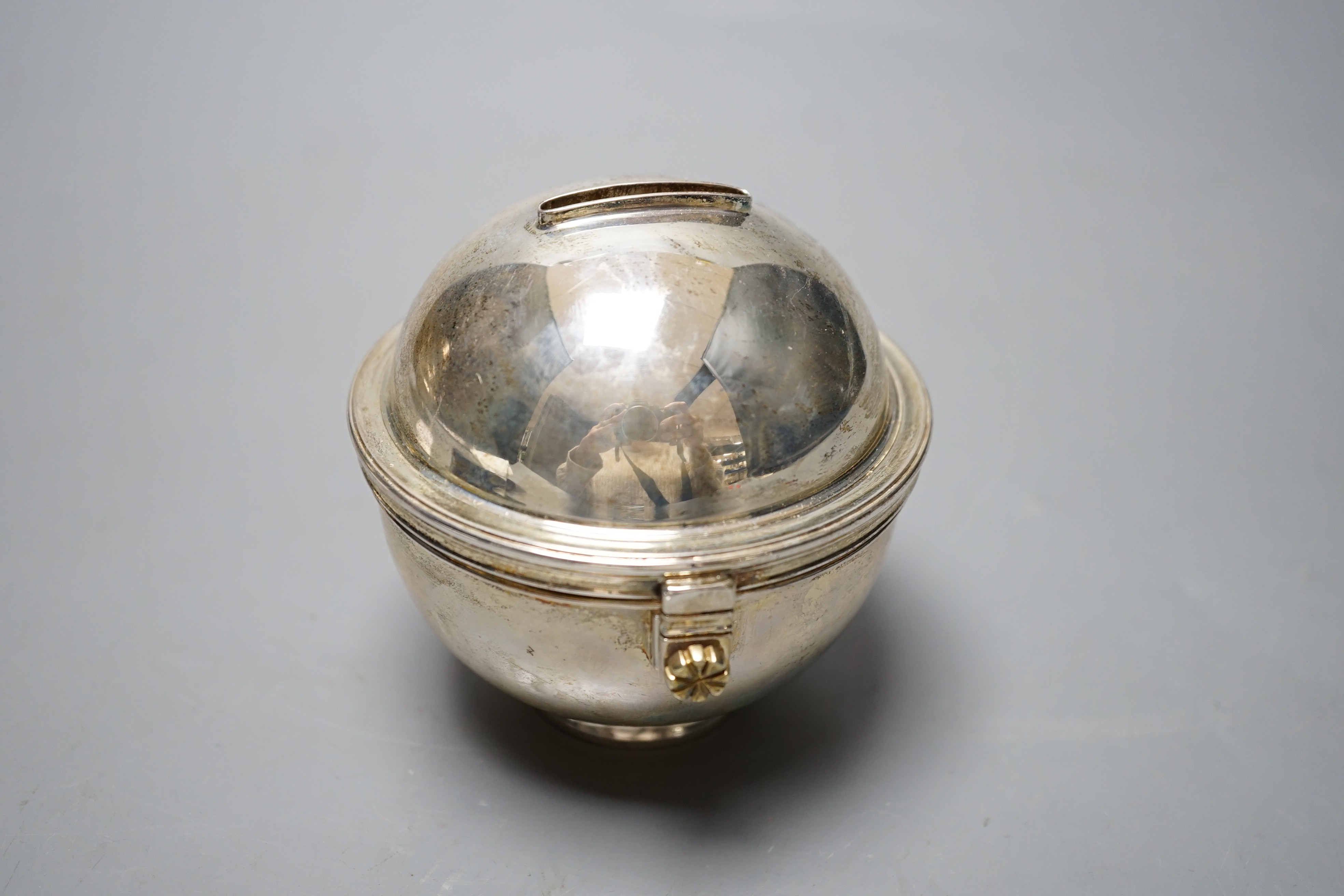 A modern Italian silver globular money box, retailed by Bulgari, London, import marks, height 91mm, gross 7.3 oz.
